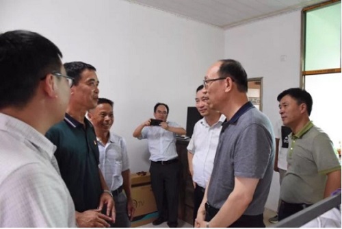 中国信保宋曙光董事长赴江西余干调研扶贫工作